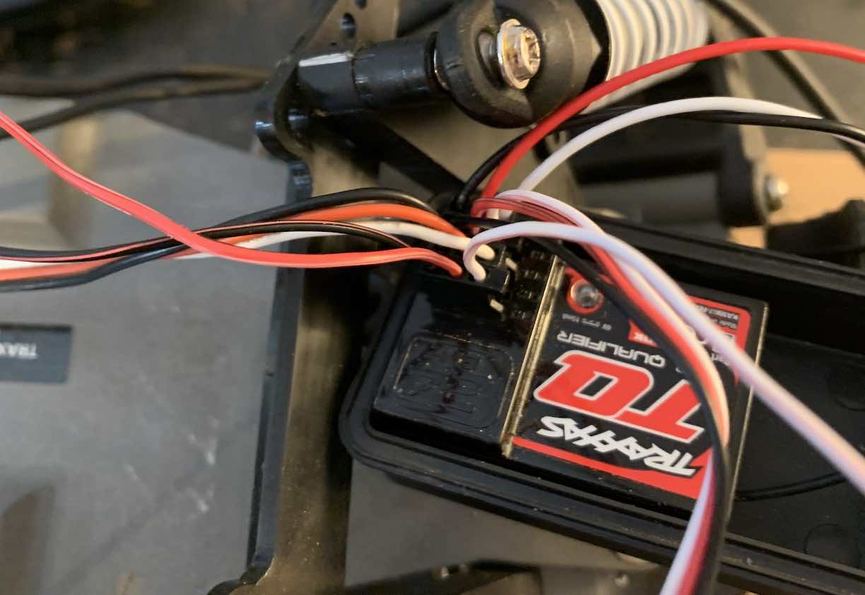 an rc car reciever with a bunch of cables coming out of it